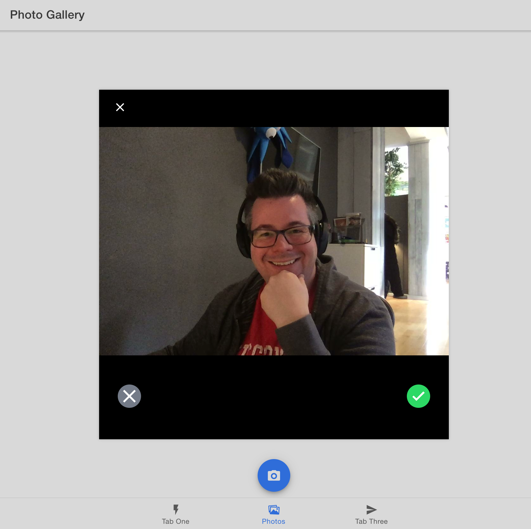 Screenshot of a photo gallery app displaying a webcam selfie.